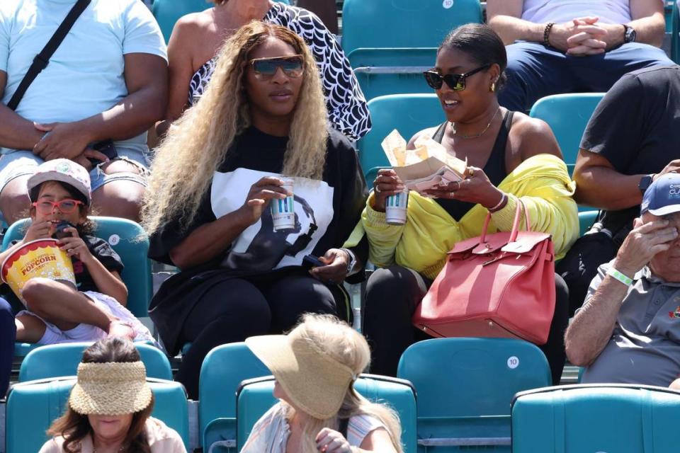 Serena Williams watches her sister American tennis player Venus Williams play against Russian tennis player Diana Shnaider during the Women’s First Round of the Miami Open in the Grandstand at the Hard Rock Stadium on Tuesday, March 19, 2024, in Miami Gardens, Florida.