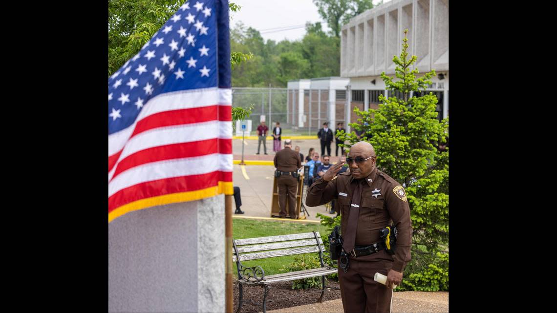 A deputy salutes during the St. Clair County Law Enforcement Memorial Service Tuesday.
