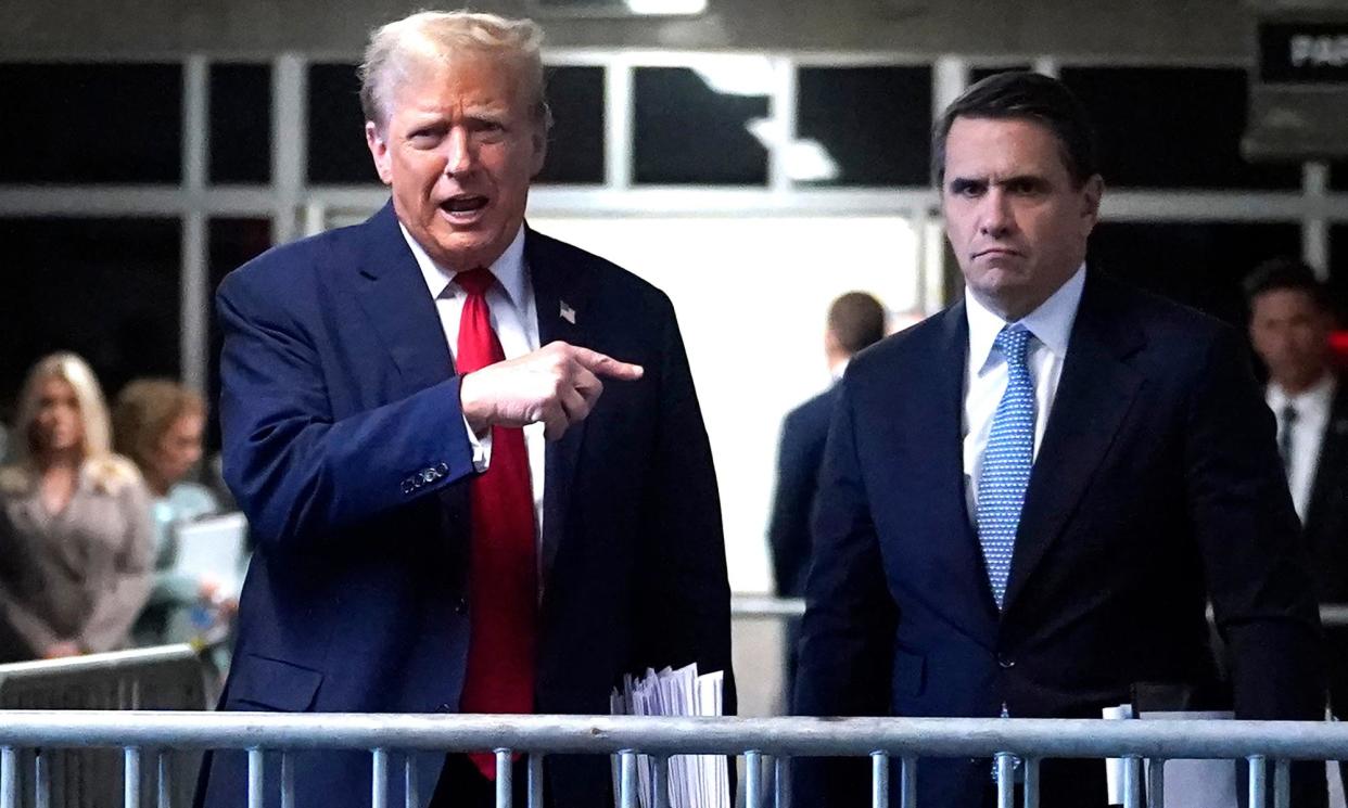 <span>Donald Trump with his lawyer Todd Blanche outside court on Tuesday.</span><span>Photograph: Timothy A Clary/EPA</span>