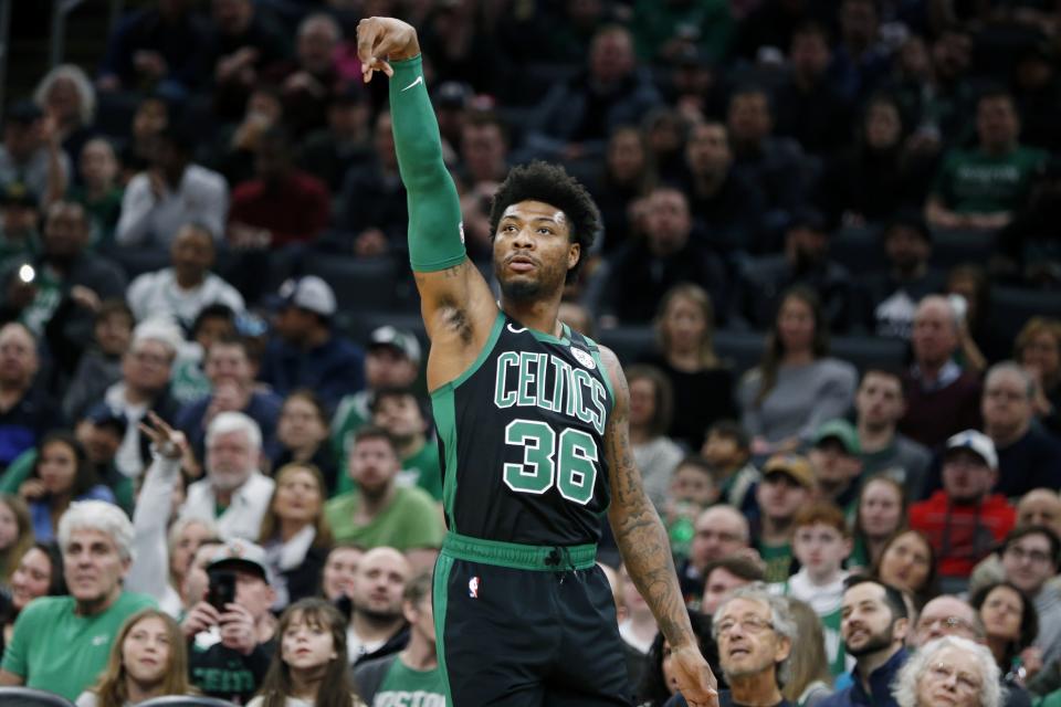Boston Celtics' Marcus Smart plays against the Oklahoma City Thunder during the first half of an NBA basketball game, Sunday, March, 8, 2020, in Boston. (AP Photo/Michael Dwyer)