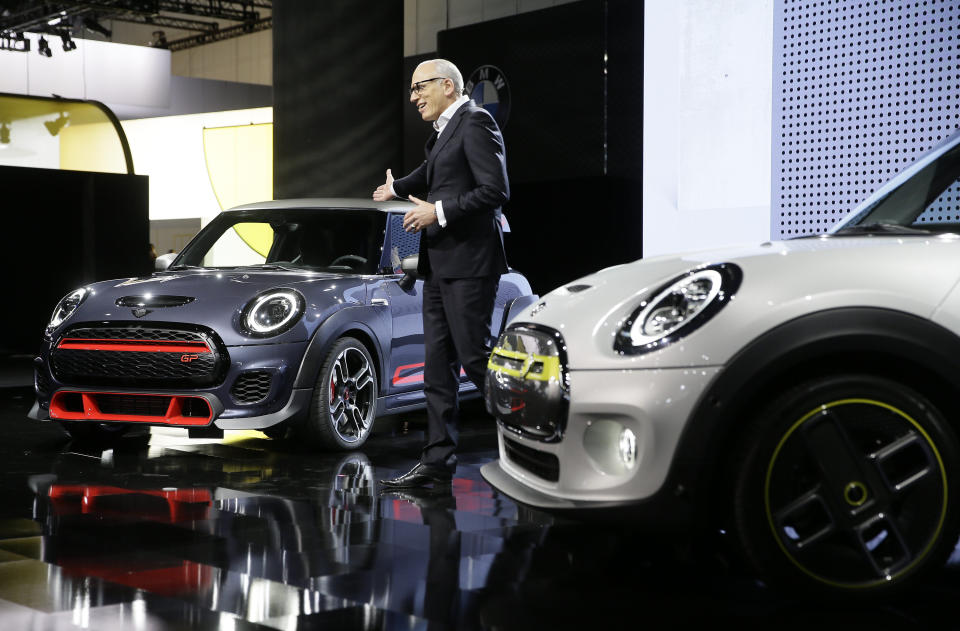 FILE - Pieter Nota, member of the Board of Management of BMW AG, introduces their new Mini John Cooper Works GP, left, and the MINI Electric Concept Car at the AutoMobility LA auto show at the Los Angeles Convention Center in Los Angeles on Nov. 20, 2019. German automaker BMW is set to announce plans to build the next generation electric Mini in Britain after securing U.K. government support for a multimillion-pound investment in the company’s Oxford factory. The government on Monday, Sept. 11, 2023, confirmed its backing for the project, which will protect 4,000 jobs. (AP Photo/Damian Dovarganes)