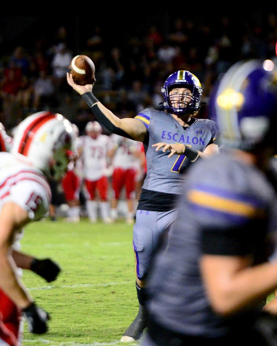 Escalon quarterback Donovan Rozevink (7) throws a pass to the endzone during a game between Escalon High School and Ripon High School in Escalon, California on October 20, 2023. 