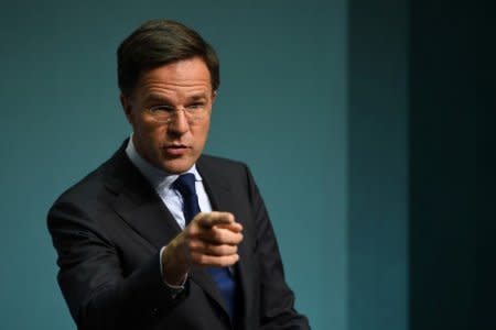 FILE PHOTO: Netherlands' Prime Minister Mark Rutte gestures during a news conference at Government Buildings in Dublin, Ireland December 6, 2017. REUTERS/Clodagh Kilcoyne