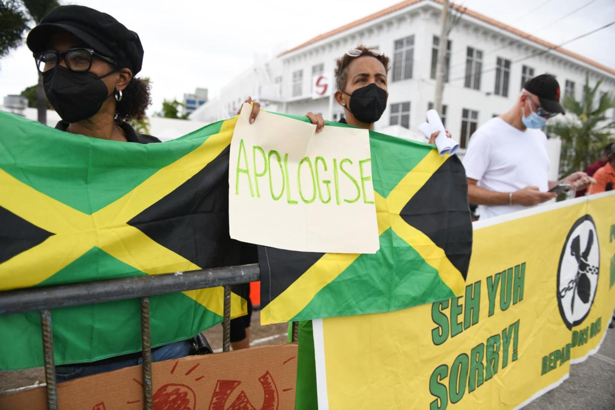 Une manifestation contre la venue de Kate et William en Jamaïque le 22 mars 2022 - Ricardo Makyn / AFP