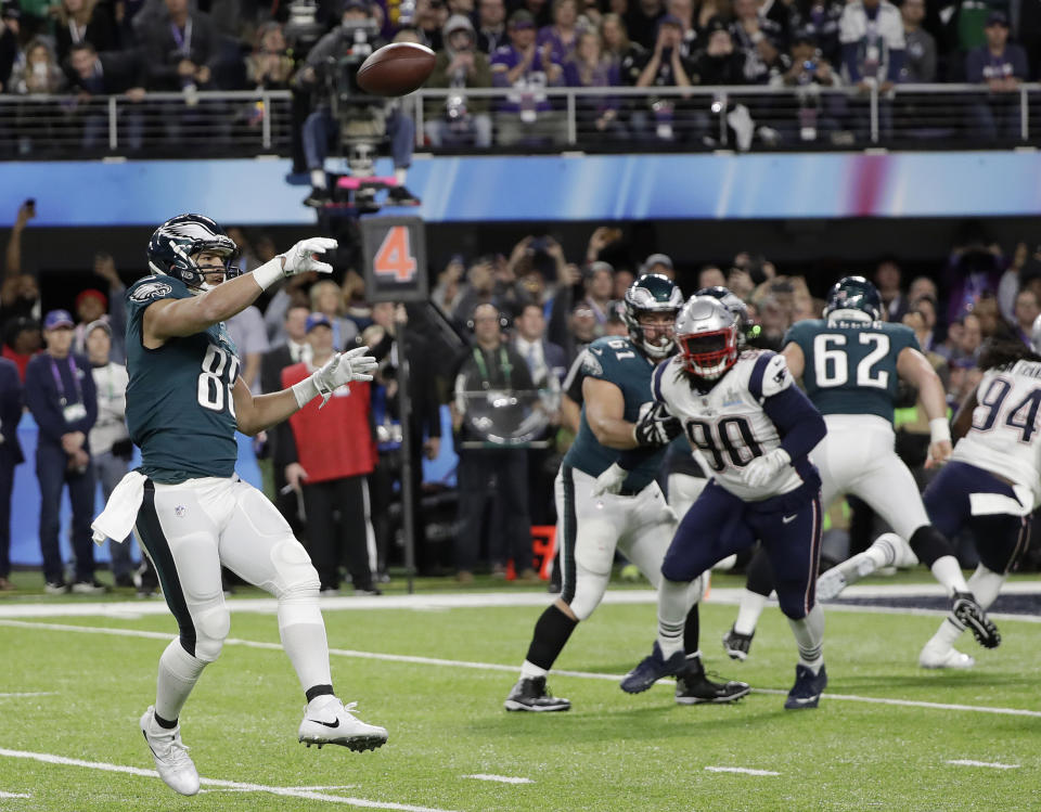 FILE - In this Feb. 4, 2018, file photo, Philadelphia Eagles' Trey Burton, left, throws a touchdown pass to Nick Foles during the first half of the NFL Super Bowl 52 football game against the New England Patriots, in Minneapolis. The "Philly Special" _ on a fourth down late in the first half of Super Bowl 52 will be remembered as one of the gutsiest calls in sports history. (AP Photo/Mark Humphrey, File)