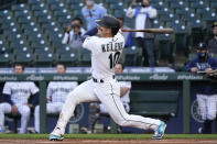 Seattle Mariners' Jarred Kelenic watches his foul ball in his first major league at-bat, in the first inning of the team's baseball game against the Cleveland Indians on Thursday, May 13, 2021, in Seattle. Kelenic flied out on the at-bat. (AP Photo/Elaine Thompson)