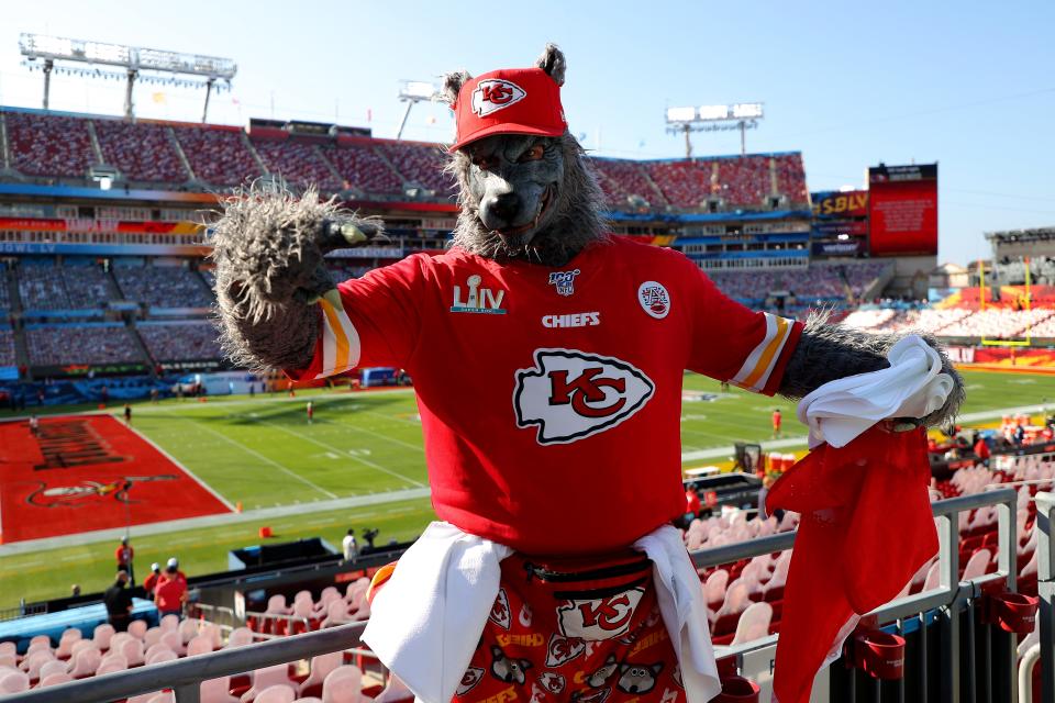 A fan in a werewolf costume poses before Super Bowl LV between the Tampa Bay Buccaneers and the Kansas City Chiefs at Raymond James Stadium on February 07, 2021 in Tampa, Florida. The fan, dubbed as "ChiefsAholic" was arrested Friday after he was on the run from bank robbery charges.