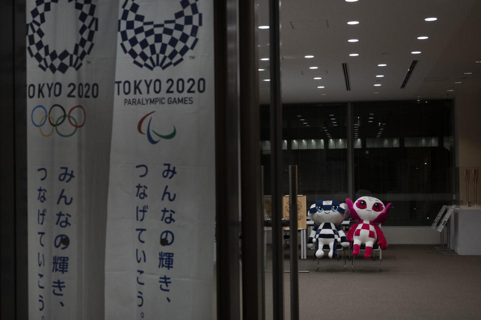 Miraitowa and Someity, mascots for the Tokyo 2020 Olympics and Paralympics are seen in Tokyo, Tuesday, March 24, 2020. IOC President Thomas Bach has agreed "100%" to a proposal of postponing the Tokyo Olympics for about one year until 2021 because of the coronavirus outbreak, Japanese Prime Minister Shinzo Abe said Tuesday. (AP Photo/Jae C. Hong)