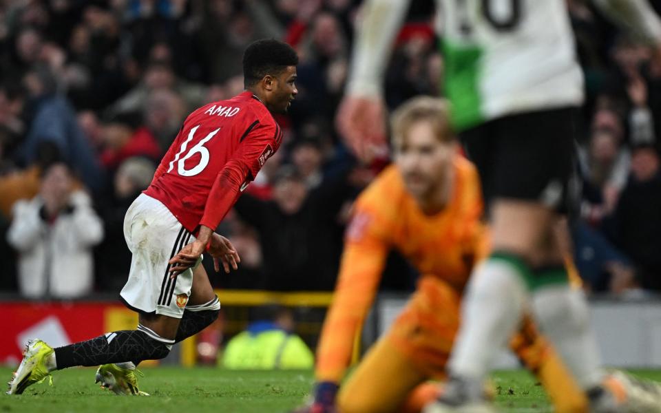 Amad Diallo wheels away after his extra-time winner against Liverpool