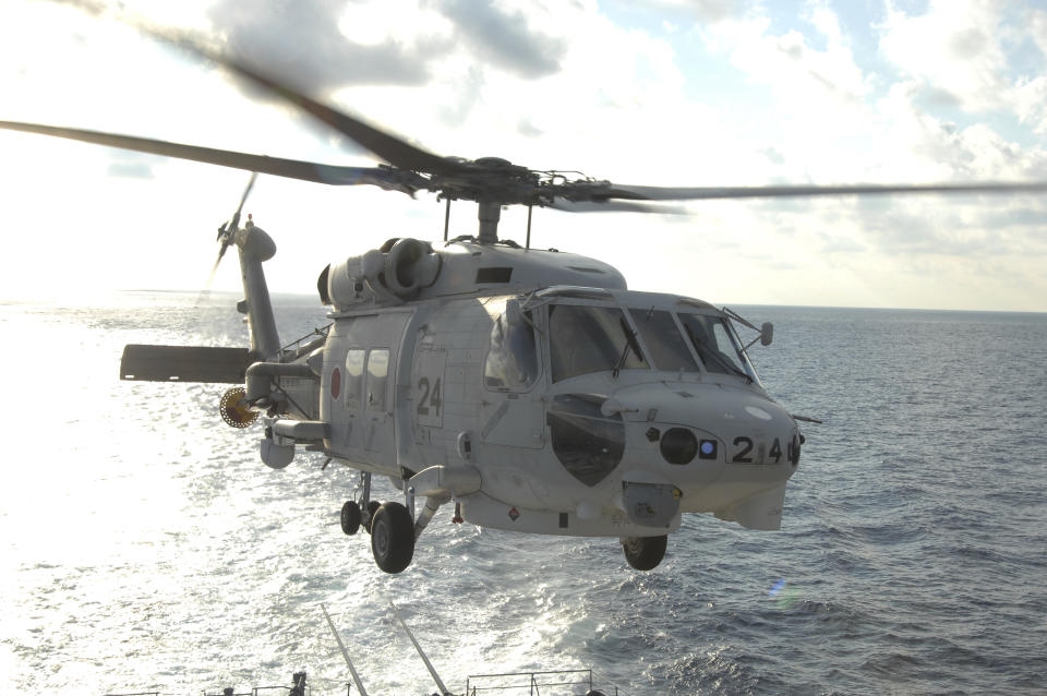 This undated photo released by and taken from the official website of the Japan Maritime Self-Defense Force, shows a SH-60K chopper. Two Japanese navy helicopters of the same type crashed in the Pacific Ocean south of Tokyo during a nighttime training flight after possibly colliding with each other, the country's defense minister said Sunday, April 21, 2024. (The official website of the Japan Maritime Self-Defense Force via AP)