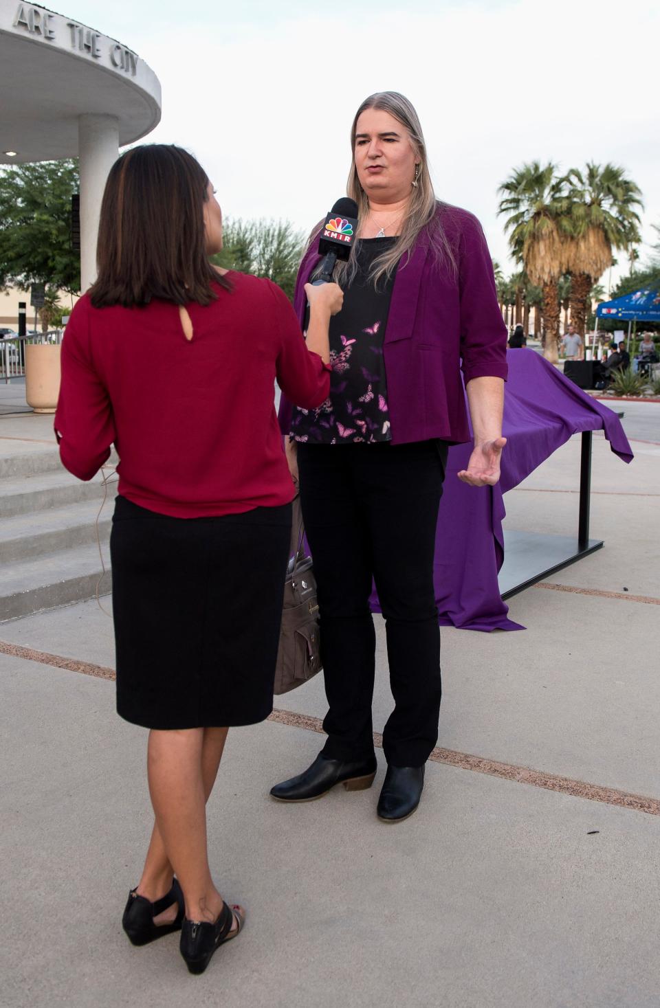 Gwendolyn Ann Smith is interviewed prior to a candlelight vigil at the Palm Springs City Hall as the Transgender Community Coalition honors the memory of those whose lives were lost in acts of anti-transgender violence in 2017.