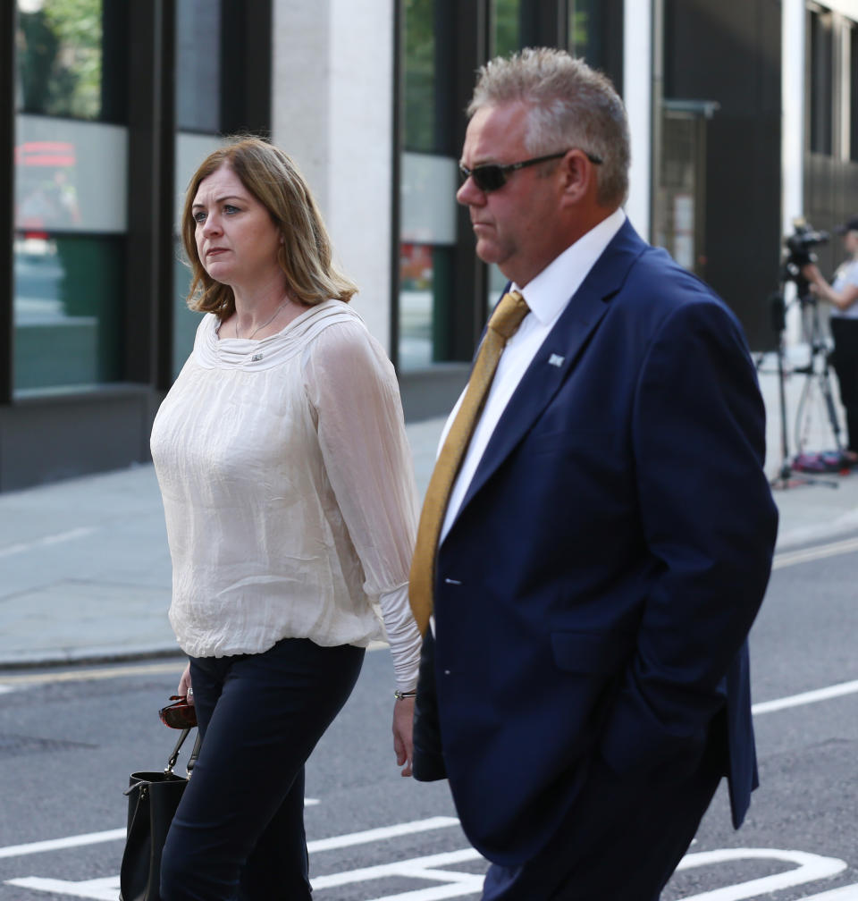 Deborah Adlam, the mother of PC Andrew Harper, and stepfather Phil arrive at the Old Bailey in London. (Yui Mok/PA Wire)    