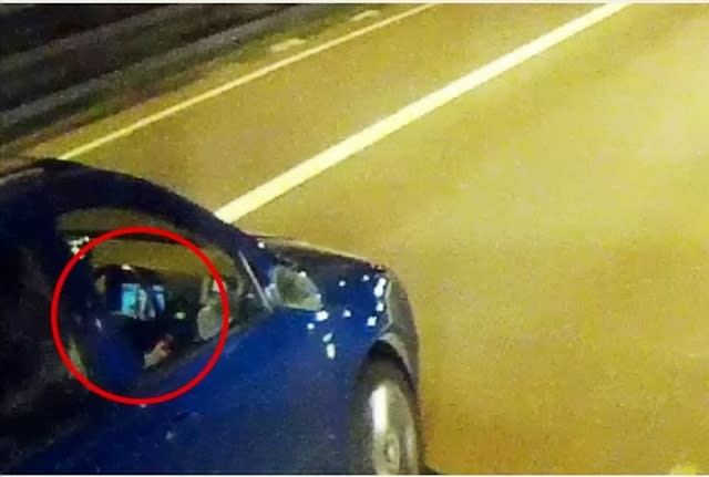 M5 driver allegedly watching movie at wheel