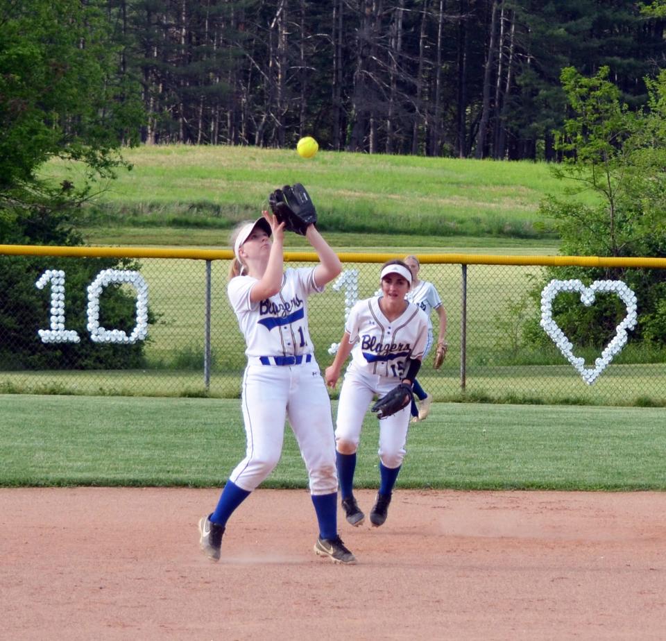 Clear Spring shortstop Lanie Weaver catches a pop fly against Smithsburg in the 1A West Region II quarterfinals.