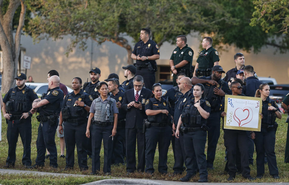 Marjory Stoneman Douglas High School staff, teachers and students return to school greeted by police and well wishers.