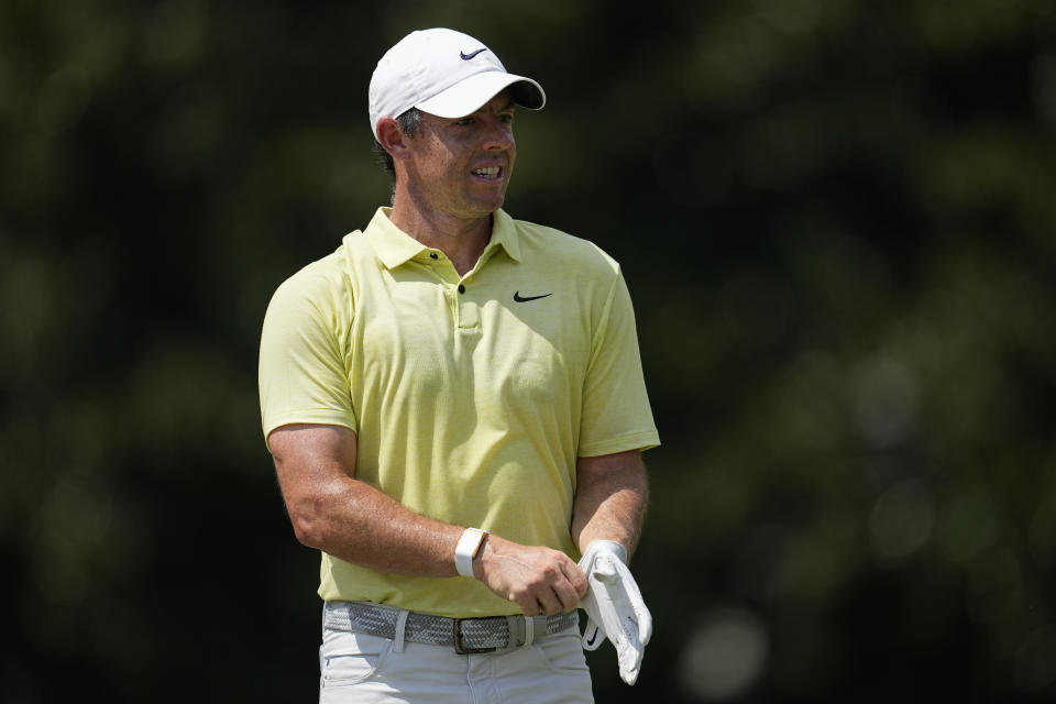 FILE - Rory McIlroy, of Northern Ireland, walks on the third green during the third round of the Tour Championship golf tournament, Saturday, Aug. 26, 2023, in Atlanta. Now, even LIV’s biggest detractor at the outset, four-time major champion McIlroy, has suggested the Ryder Cup gatekeepers consider easing their stance against LIV players competing for Europe. Golf’s prestigious team event — which pits the best from the U.S. against the best from Europe and where none of the players are paid to play — was considered more-or-less off limits to those who defected to LIV, especially on the European side. (AP Photo/Mike Stewart, File)