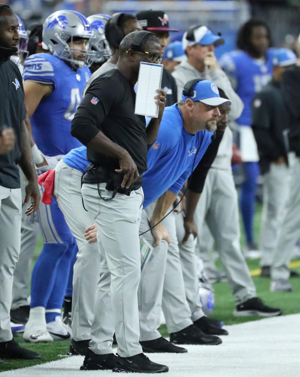 Defensive coordinator Aaron Glenn and head coach Dan Campbell on the sidelines during action against the Carolina Panthers at Ford Field in Detroit on Sunday, Oct, 8, 2023.