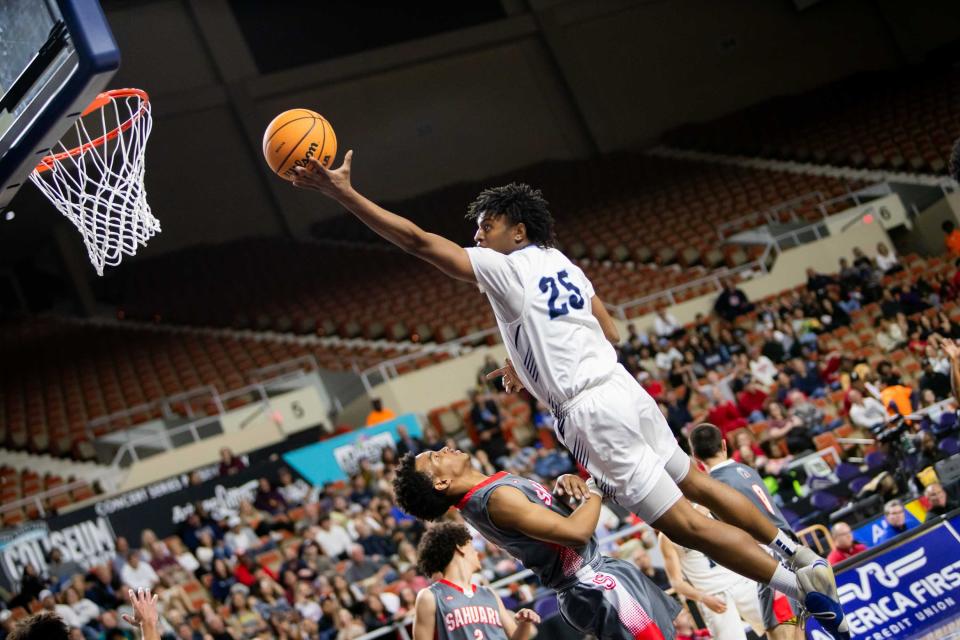 Deer Valley Skyhawks Alon Johnson (25) jumps to shoot the ball against the Sahuaro Cougars during the 4A State Championship game at Arizona Veterans Memorial Coliseum in Phoenix on Feb. 29, 2024.