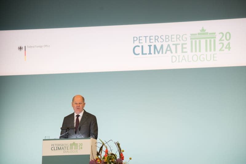 Germany's Chancellor Olaf Scholz speaks during the Petersberg Climate Dialogue. Sebastian Christoph Gollnow/dpa
