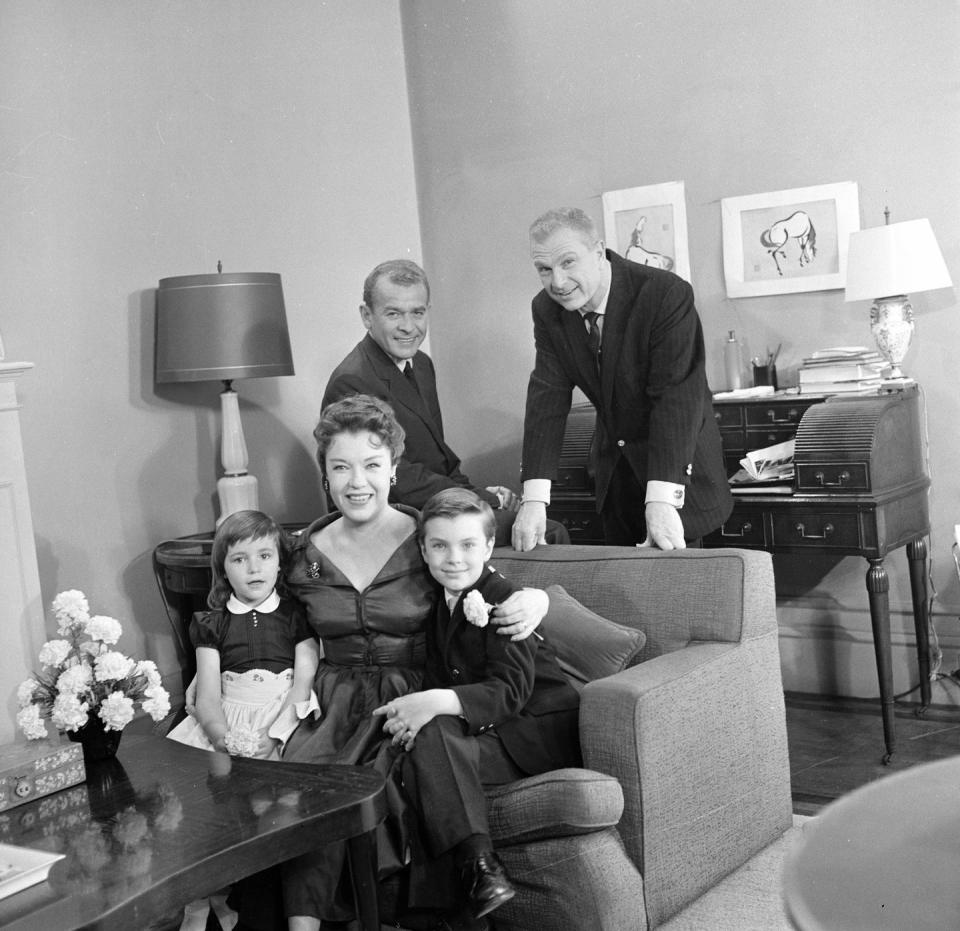 <p>Actor Eddie Albert sits for a portrait with his family during the TV program <em>Person to Person</em> in 1960. He moved to New York in 1933, pursuing a future in entertainment after the stock market crash ended his business career.</p>