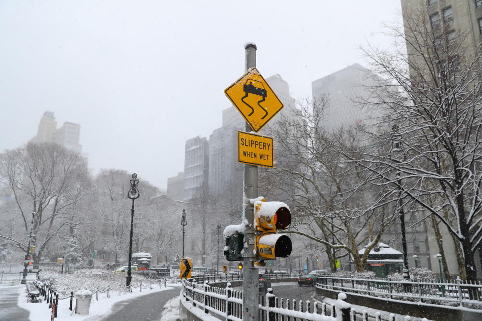 <p>A traffic sign gives fair warning just off the Brooklyn Bridge entering Manhattan as a winter storm moved into the area on Wednesday, March 21, 2018. (Photo: Gordon Donovan/Yahoo News) </p>