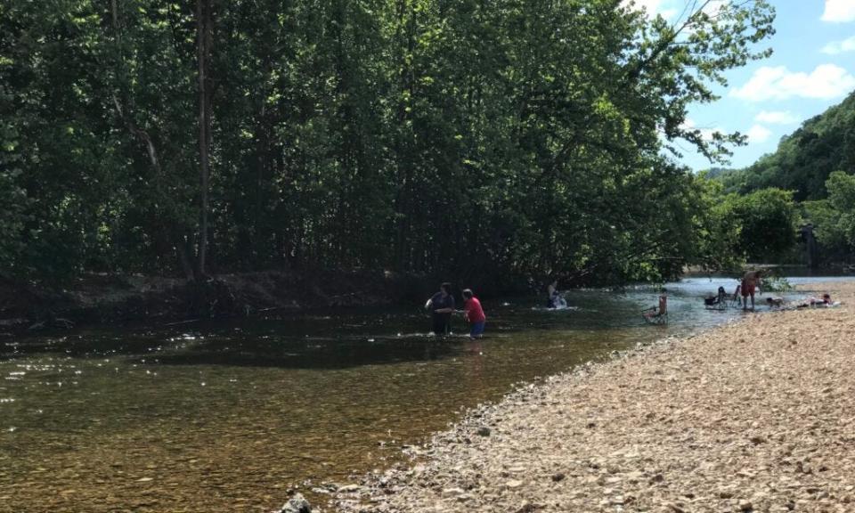 People swim and fish in the Jacks Fork River on a hot summer day in 2021. The Missouri Department of Natural Resources and environmental groups warn a Missouri Senate bill could seriously hamper the state's ability to protect clean water.