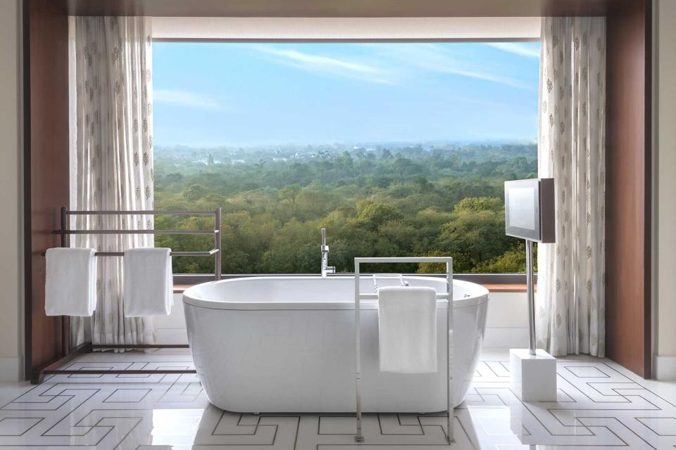 Bath tub in suite at The Oberoi, New Delhi