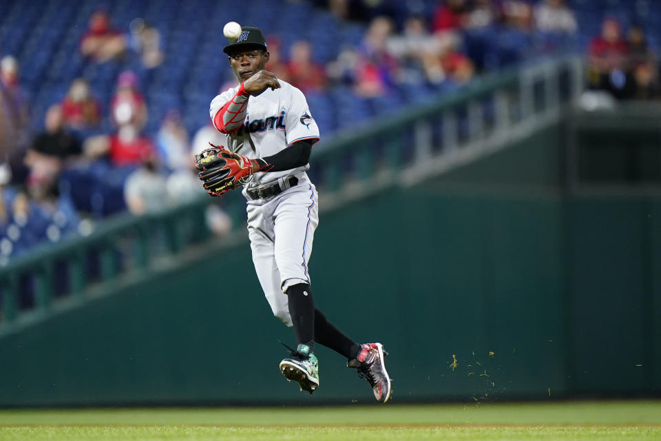 Miami Marlins second baseman Jazz Chisholm Jr. throws to first after fielding a ground out by Philadelphia Phillies' Jean Segura during the fifth inning of baseball game, Tuesday, May 18, 2021, in Philadelphia. (AP Photo/Matt Slocum)