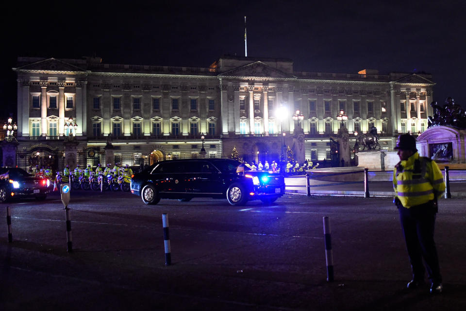 LONDON, ENGLAND - DECEMBER 03: U.S. President Donald Trump's convoy passes Buckingham Palace on day one of the NATO Leaders Summit on December 3, 2019 in London, England. France and the UK signed the Treaty of Dunkirk in 1947 in the aftermath of WW2 cementing a mutual alliance in the event of an attack by Germany or the Soviet Union. The Benelux countries joined the Treaty and in April 1949 expanded further to include North America and Canada followed by Portugal, Italy, Norway, Denmark and Iceland. This new military alliance became the North Atlantic Treaty Organisation (NATO). The organisation grew with Greece and Turkey becoming members and a re-armed West Germany was permitted in 1955. This encouraged the creation of the Soviet-led Warsaw Pact delineating the two sides of the Cold War. This year marks the 70th anniversary of NATO. (Photo by Peter Summers/Getty Images)