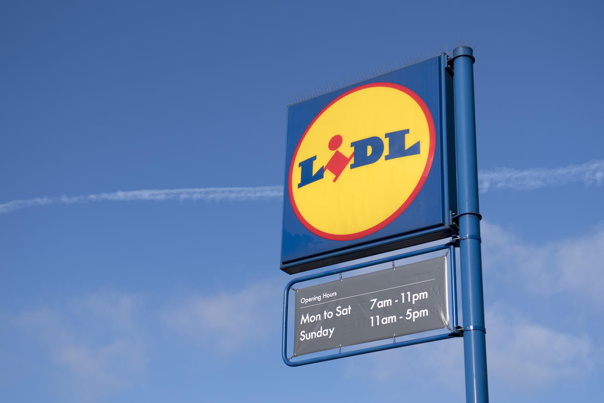 Signage is pictured at a branch of Lidl supermarket in south London