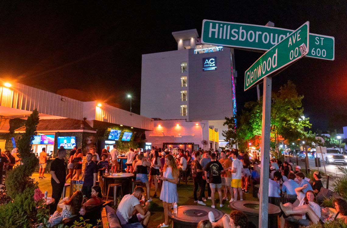 The Avenue at the corner of Glenwood Avenue and Hillsborough Street is packed on Friday July 21, 2023 in Raleigh, N.C. The popular bar located in the former Snoopy’s location has transformed the parking lot into a popular outdoor gathering spot.