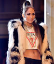 <p>J.Lo was seen on location for her new music video in Manhattan rocking a fly outfit, high pony, sultry smokey eye makeup and, of course, nude lipstick. (Photo by James Devaney/GC Images) </p>