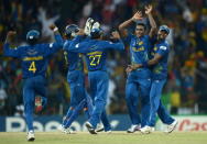 COLOMBO, SRI LANKA - OCTOBER 07: Ajantha Mendis of Sri Lanka celebrates with teammates after dismissing Andre Russell of the West Indies during the ICC World Twenty20 2012 Final between Sri Lanka and the West Indies at R. Premadasa Stadium on October 7, 2012 in Colombo, Sri Lanka. (Photo by Gareth Copley/Getty Images)