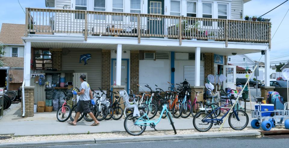 Bikes line the sidewalk outside the Shore and More General Store in Seaside Park Thursday, June 16, 2022.   The seven-year-old store provides "all of your beach needs and more," including beach bikes, beach carts, towels, apparel, beach-related gifts, and more. 