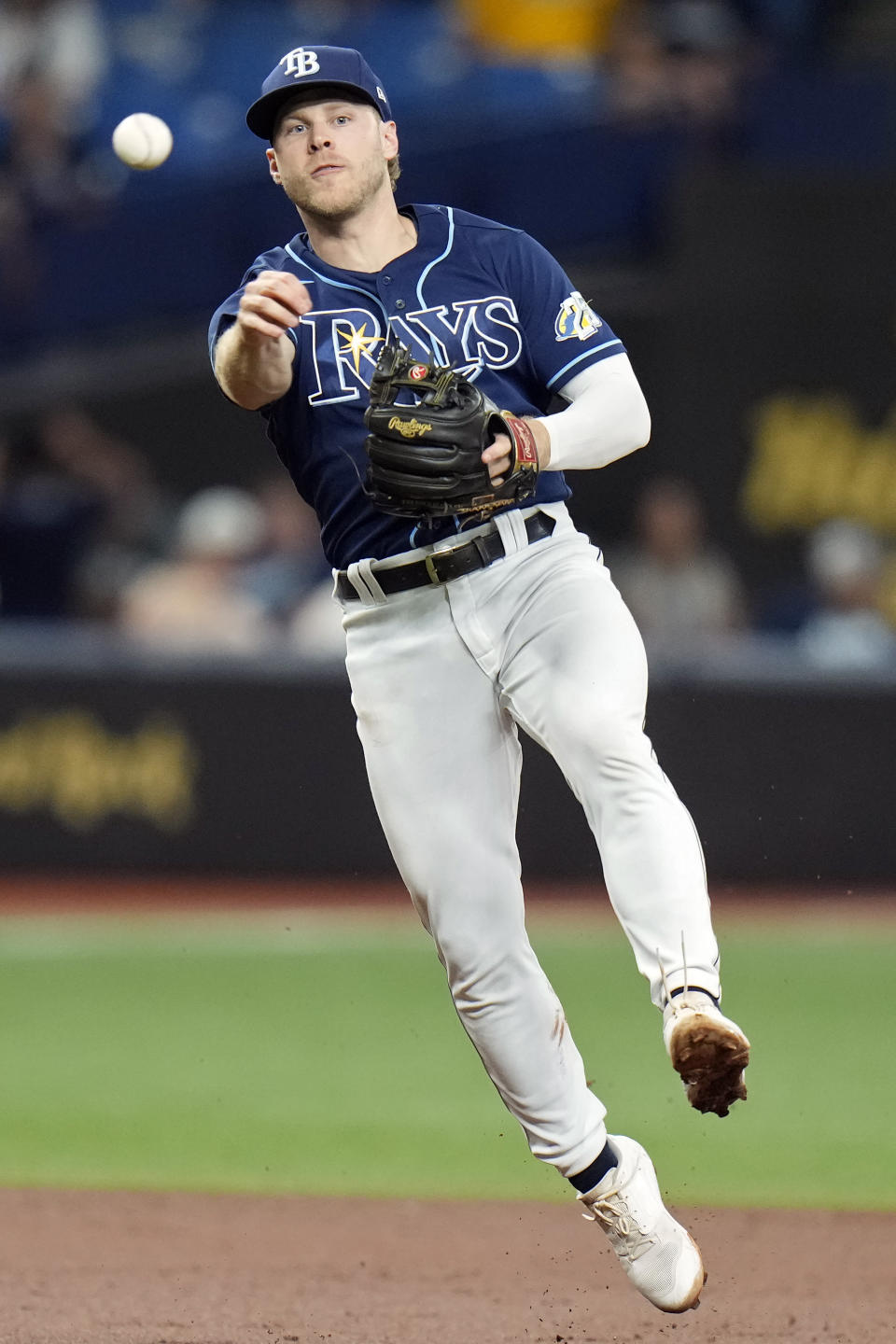 Tampa Bay Rays shortstop Taylor Walls throws out Seattle Mariners' Julio Rodriguez at first base during the third inning of a baseball game Thursday, Sept. 7, 2023, in St. Petersburg, Fla. (AP Photo/Chris O'Meara)