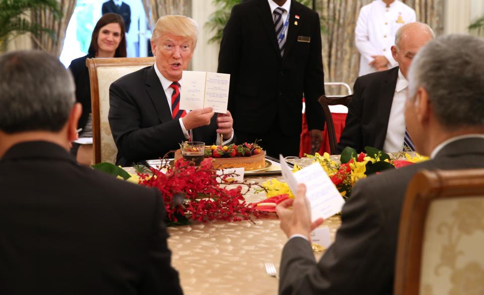 <p>President Donald Trump participates in a working luncheon hosted by Singapore’s Prime Minister Lee Hsien Loong at the Istana, Singapore on June 11, 2018. Officials from both delegations also attended the luncheon. (Photo: Ministry of Communications and Information, Republic of Singapore/Handout/Anadolu Agency/Getty Images) </p>