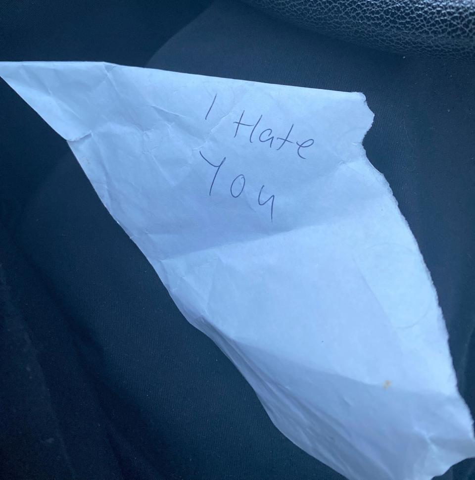 A note that says "I hate you"