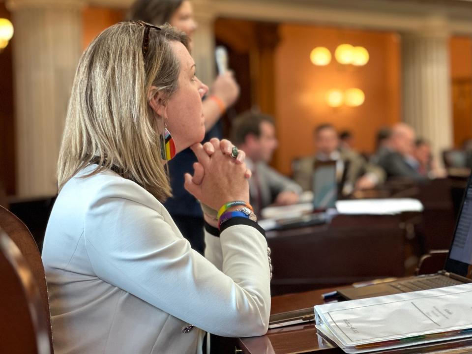 House Minority Leader Allison Russo, D-Upper Arlington, wears pride earrings and bracelets on the floor of the Ohio House.