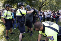 <p>State and city police inspect people arriving for a “Free Speech” rally on Boston Common, Saturday, Aug. 19, 2017, in Boston. (Photo: Michael Dwyer/AP) </p>
