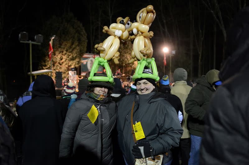 Visitors wear custom-made balloon hats to celebrate the 133rd Groundhog Day in Punxsutawney, Pennsylvania