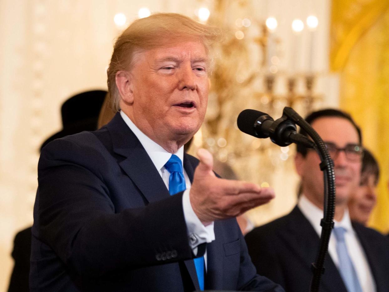 President Trump speaks during a Hanukkah reception in the East Room of the White House on 11 December 2019: Manuel Balce Ceneta/AP