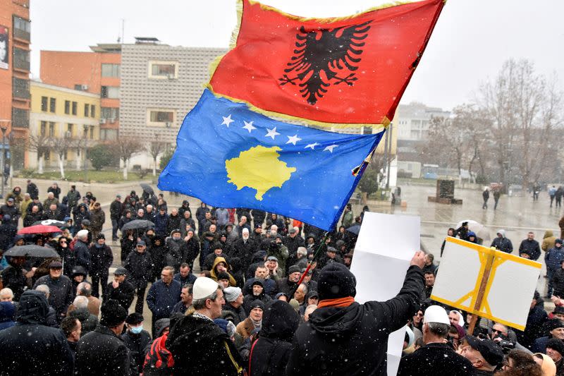 FILE PHOTO: People protest against the Association of municipalities with a Serbian majority in Pristina