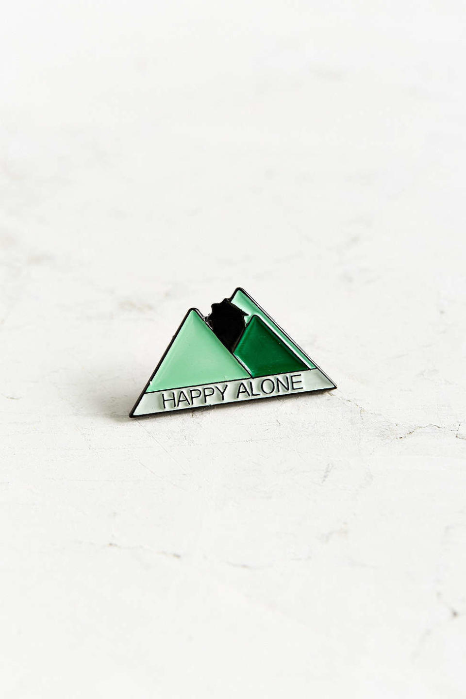 <a href="http://www.urbanoutfitters.com/urban/catalog/productdetail.jsp?id=39454426&amp;category=SEARCH+RESULTS" target="_blank">Stay Home Club Happy Alone Lapel&nbsp;Pin</a>, $10 at <a href="http://www.urbanoutfitters.com/urban/index.jsp?cm_sp=SITE_HEADER-_-HOME-_-index.jsp" target="_blank">Urban Outfitters</a>