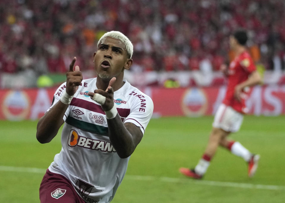 John Kennedy of Brazil's Fluminense celebrates scoring his side's opening goal against Brazil's Internacional during a Copa Libertadores semifinal second leg soccer match at Beira Rio stadium in Porto Alegre, Brazil, Wednesday, Oct. 4, 2023. (AP Photo/Andre Penner)