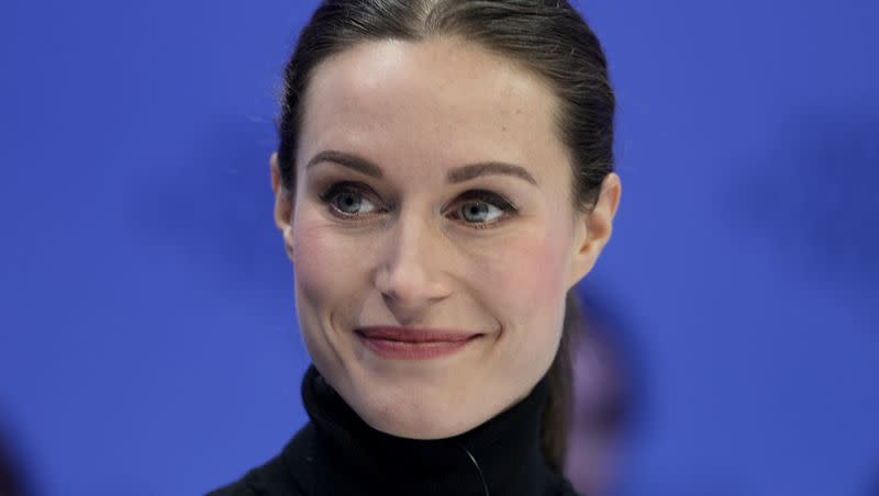 Finland’s Prime Minister Sanna Marin smiles as she attends a panel at the World Economic Forum in Davos, Switzerland, Tuesday, Jan. 17, 2023. Finland was just named the “happiest” country by the United Nations Sustainable Development Solutions Network Monday — for the sixth consecutive year.