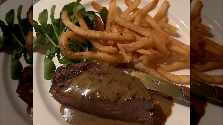steak au poivre with french fries