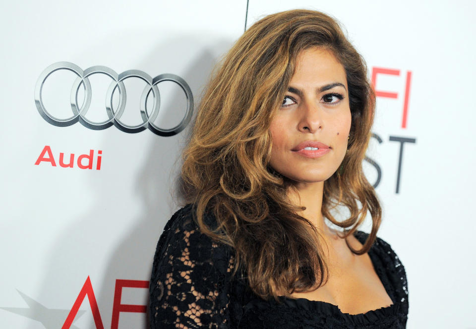 FILE - This Nov. 3, 2012 file photo shows actress Eva Mendes at the "Holy Motors" special screening as part of AFI Fest in Los Angeles. Mendes is the new face of Vogue Eyewear for their autumn/winter 2013 collection. Mendes is working on her own clothing line for New York & Company and is hoping to have it in stores for the fall. She's also been tapped to represent Vogue eyewear. (Photo by Jordan Strauss/Invision/AP, file)