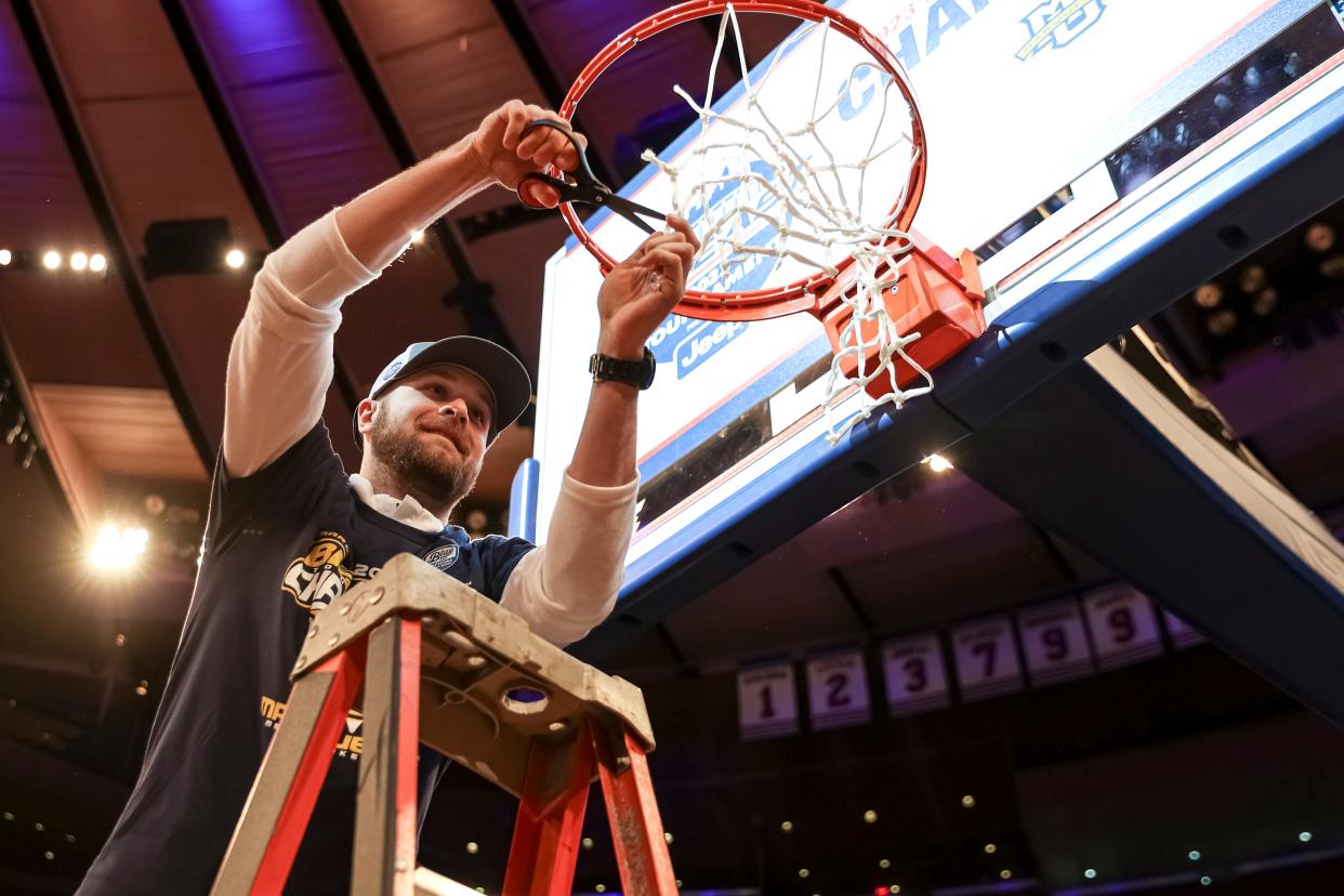 Marquette basketball staff member Ben Retzlaff helped design the new court that the Golden Eagles use at Fiserv Forum.