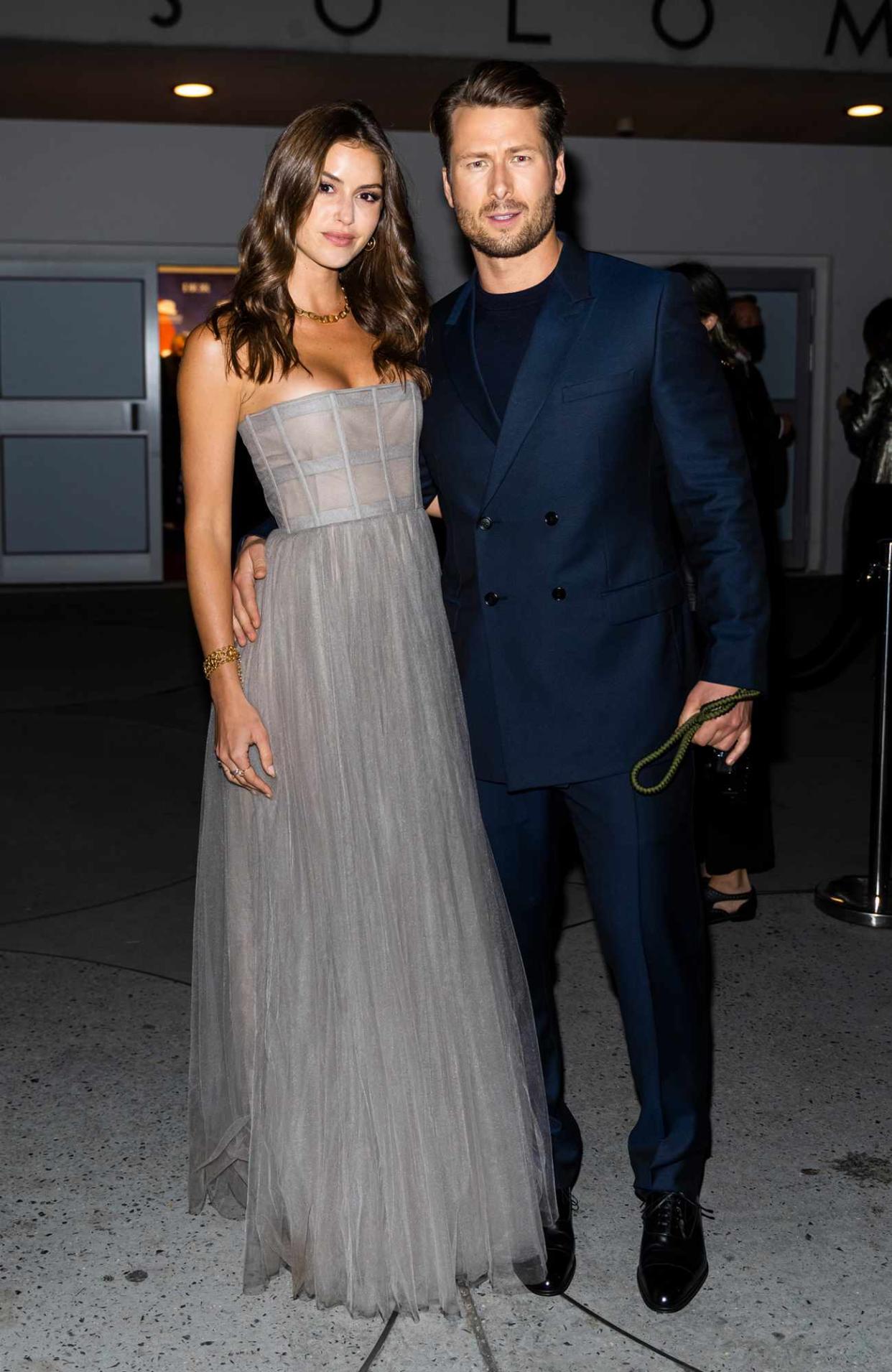 Gigi Paris and Glen Powell attend the 2021 Guggenheim International Gala in New York City