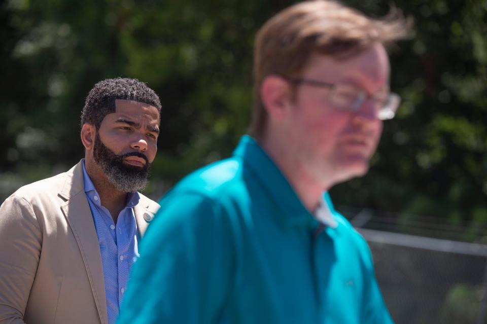 Jackson Mayor Chokwe Antar Lumumba, left, listens, as city engineer Robert Lee, a former public works director, addresses the media during an update on the state of water treatment issues in the city during a news conference at the O.B. Curtis Water Treatment Plant in Ridgeland on Monday, Aug. 8, 2022.